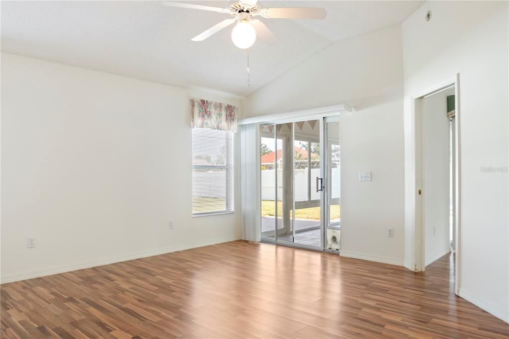 Master bedroom with sliding doors out to lanai.  Removable dog door.