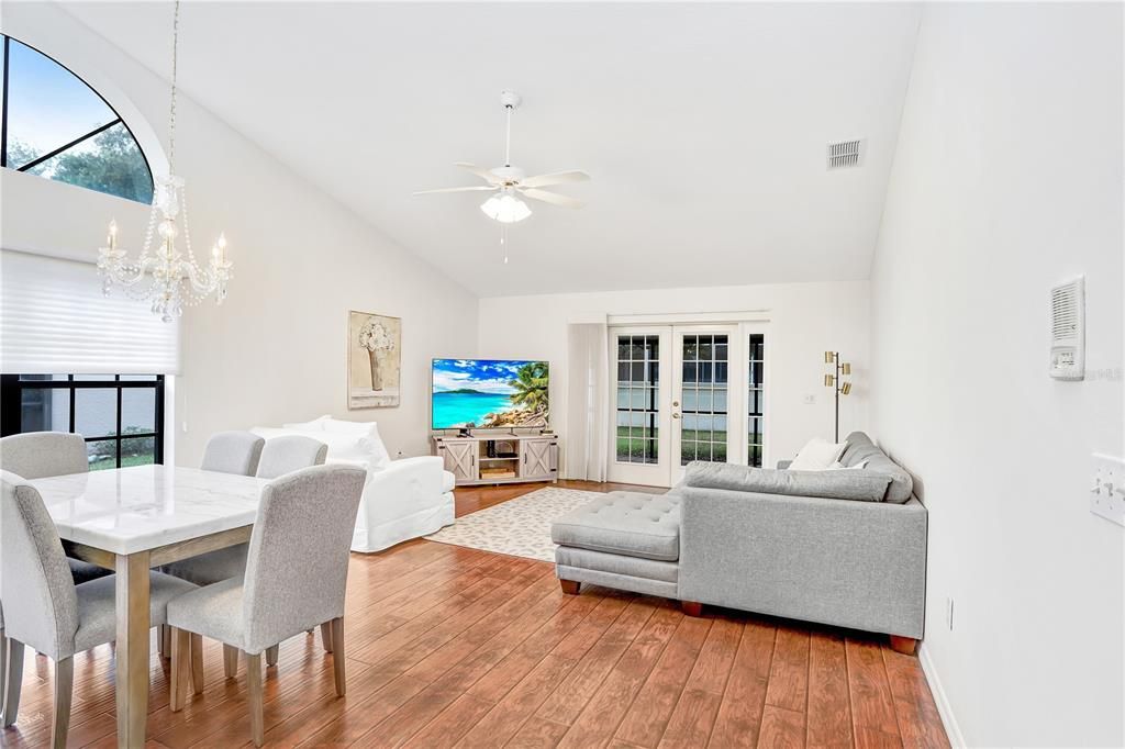 Beautiful family room with tons of natural light & vaulted ceilings!