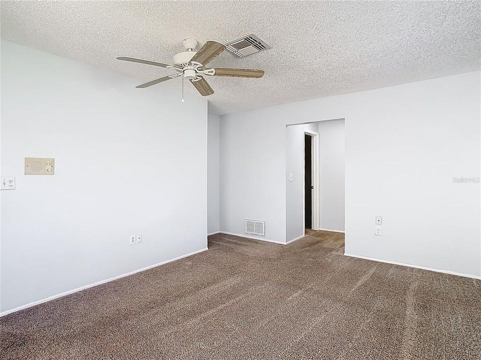 From Master Bedroom leading to the Walk-in Closet on the left and en suite Bathroom to the right