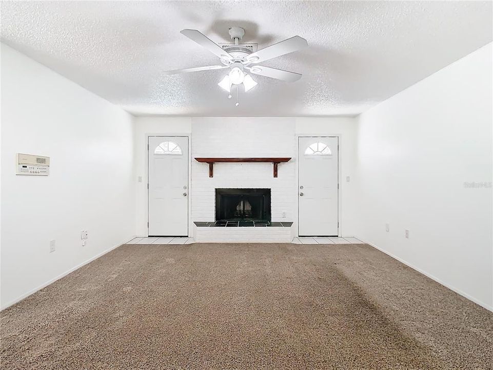 Family Room with Wood Burning Fireplace