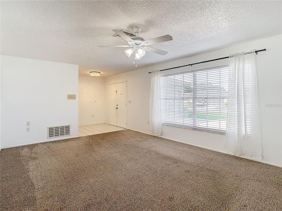 Looking from the Living Room towards the Front Entrance