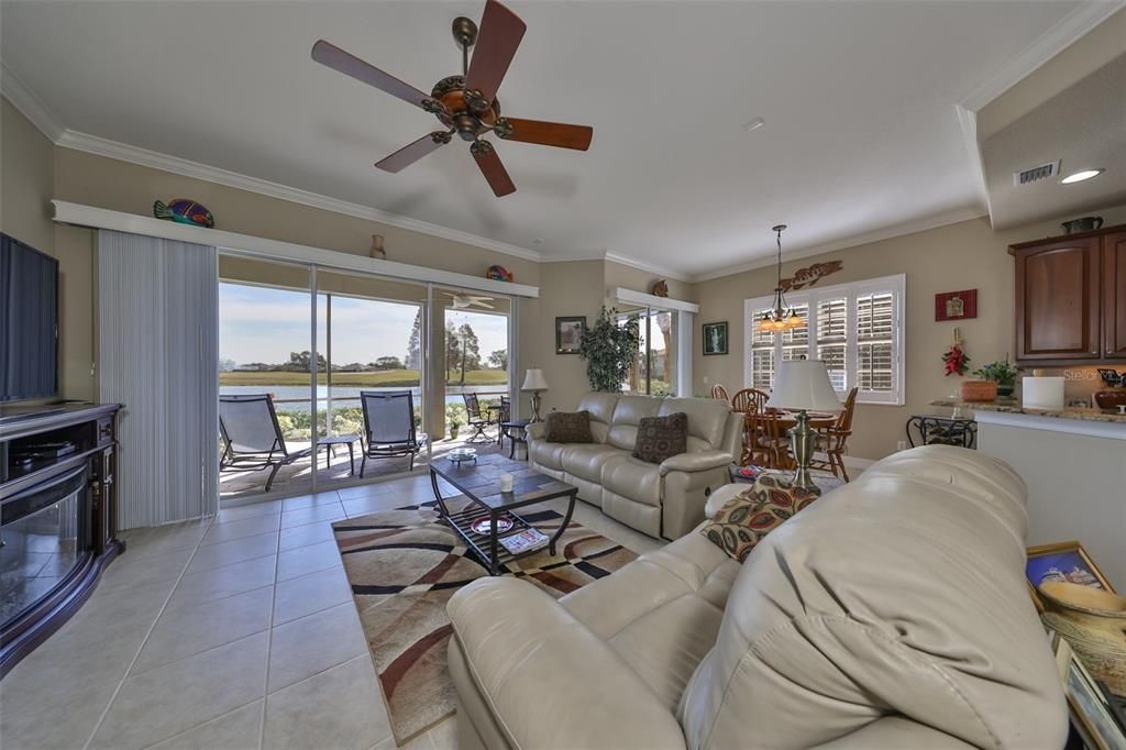 Over size triple and double sliding glass doors bring in massive Florida sunshine.  Water views are seen from anywhere at this end of the condo.