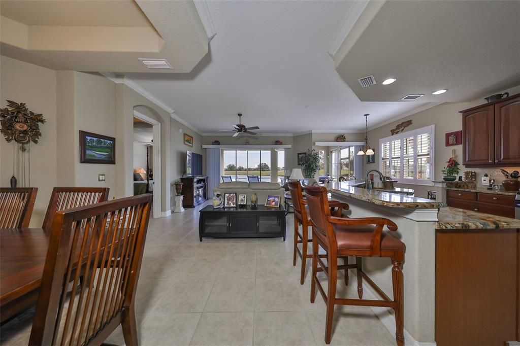 From the foyer you walk right into an OPEN FLOOR plan with a wall to wall water view.