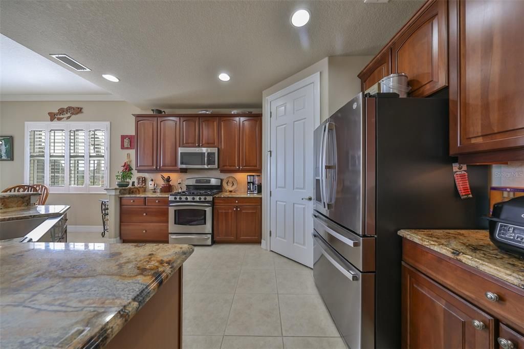 Notice the 42" cabinetry and drawers next to the duel energy stove.