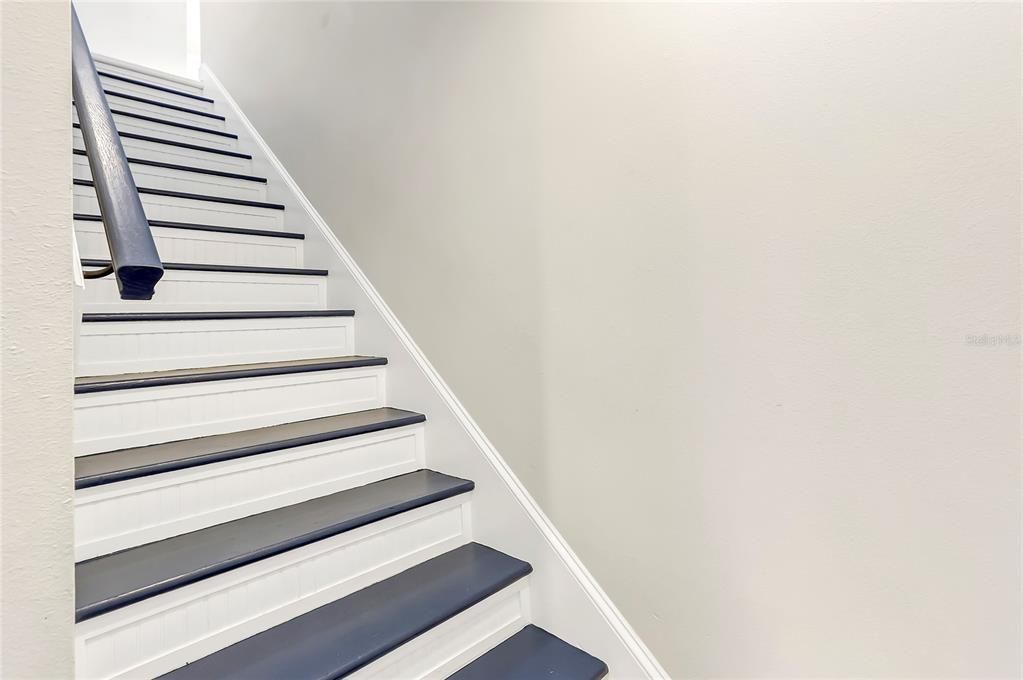 Stairs off the kitchen