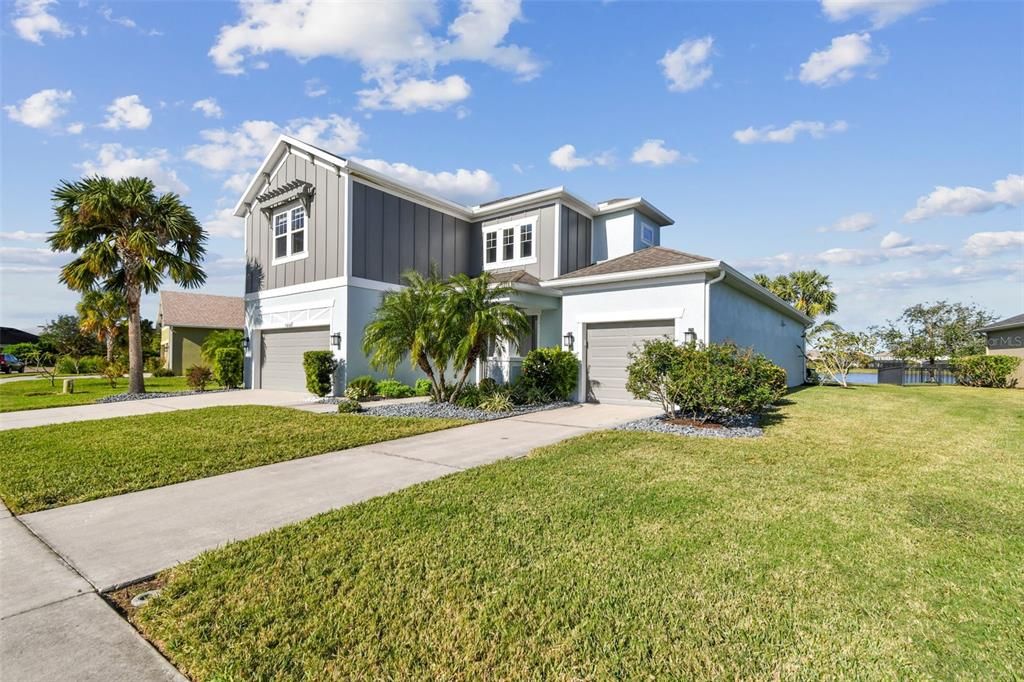 Two car garage on the left side of the entry. Additional single car garage on the right hand side.