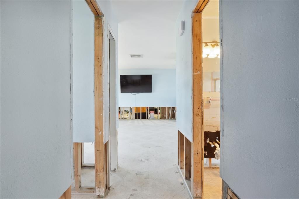 bedroom hallway looking into living room