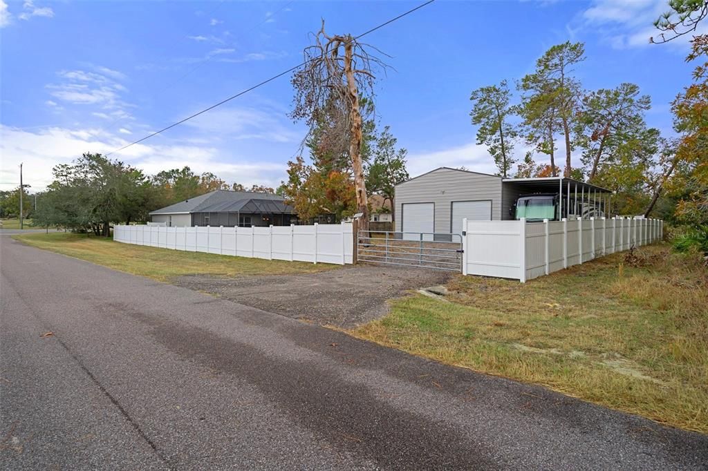 The House is on a Corner Lot with a seperate entrance to the Metal Building