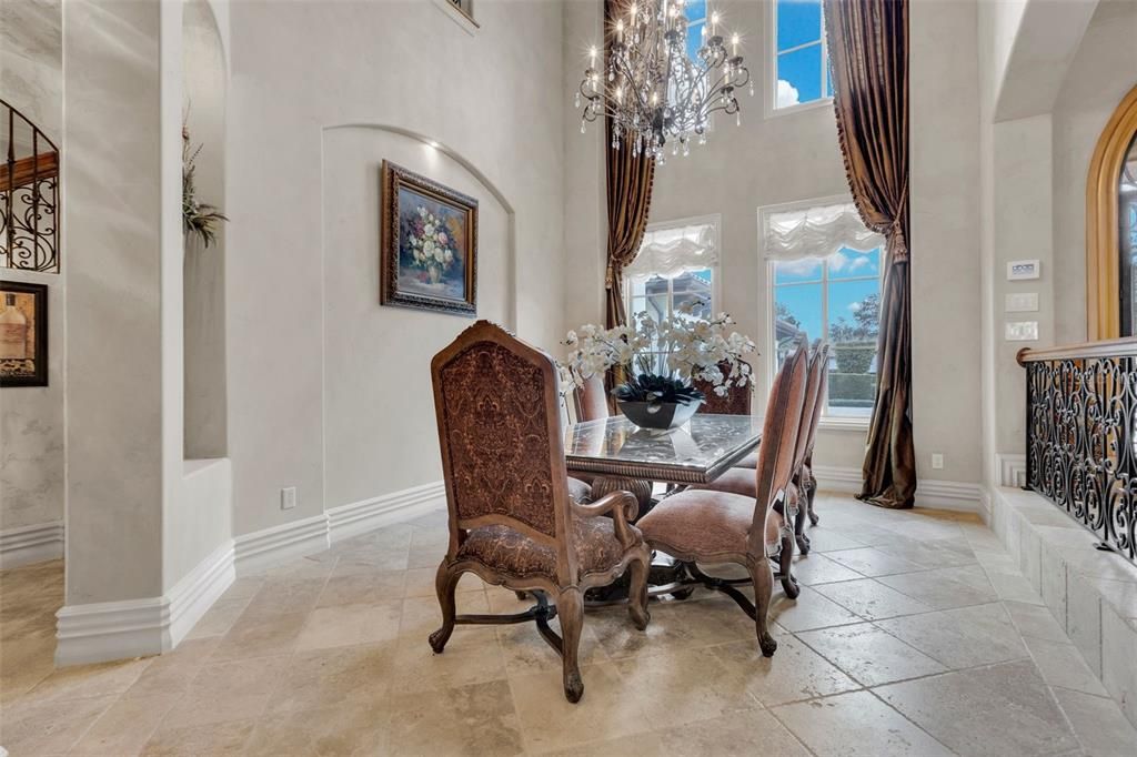 Formal Dining room with vaulted ceiling