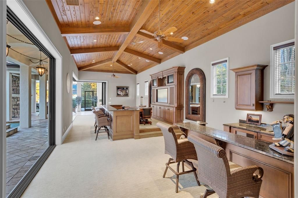 Fabulous Wood inlaid ceiling graces the full game room