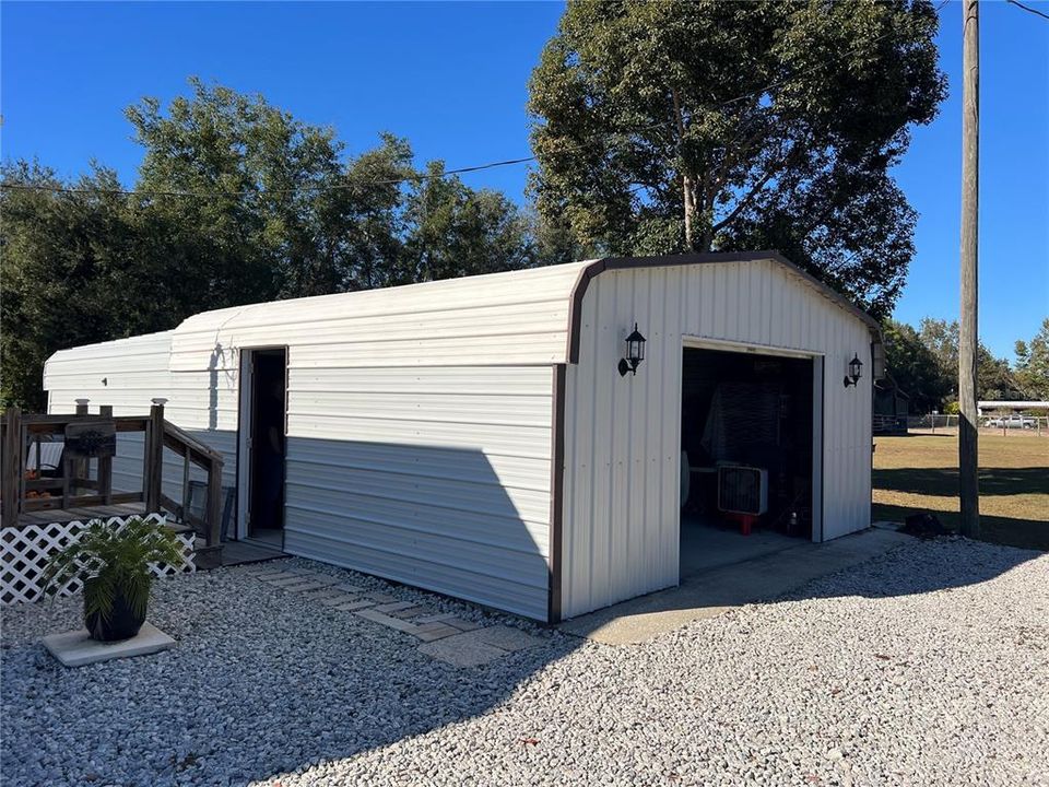 Second garage can hole 4 more cars with a working shop