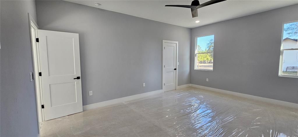 Master Bedroom. New carpet covered in plastic.