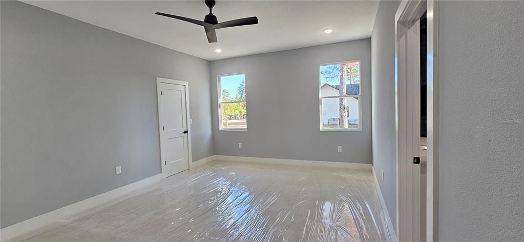 Master Bedroom. New carpet covered in plastic.