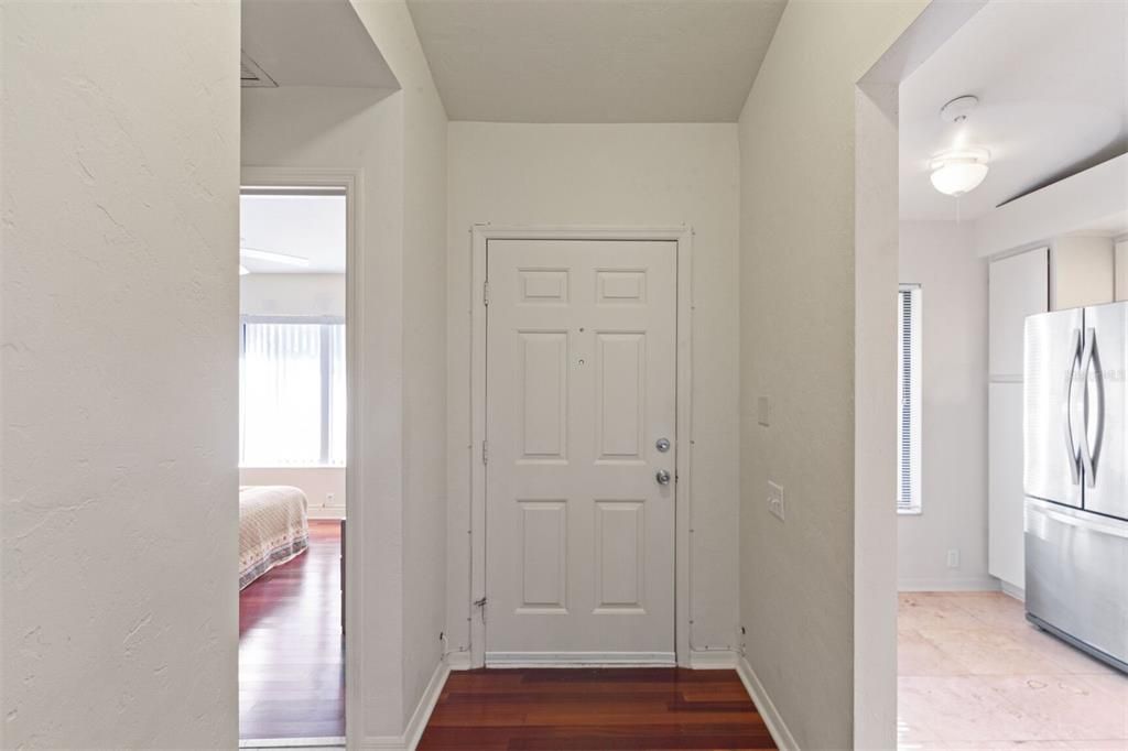 Foyer w/Front Bedroom to the Right & Kitchen to the Left