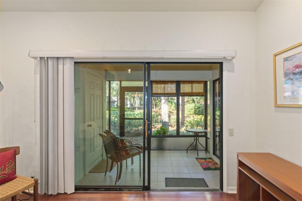 View of beautiful Greenspace from Screened Porch w/ Storage Closet