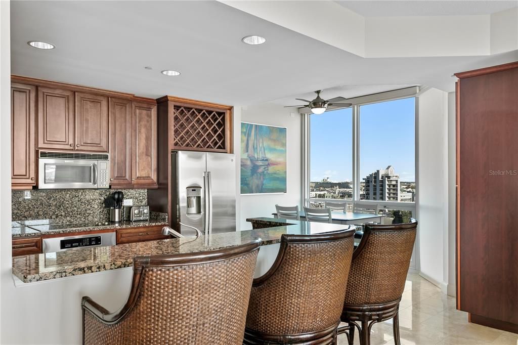 Nicely sized kitchen with bar seating is perfect for entertaining