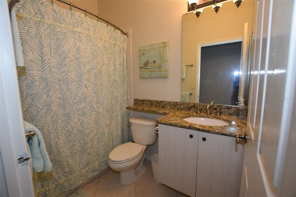 Guest bathroom with stone granite countertop