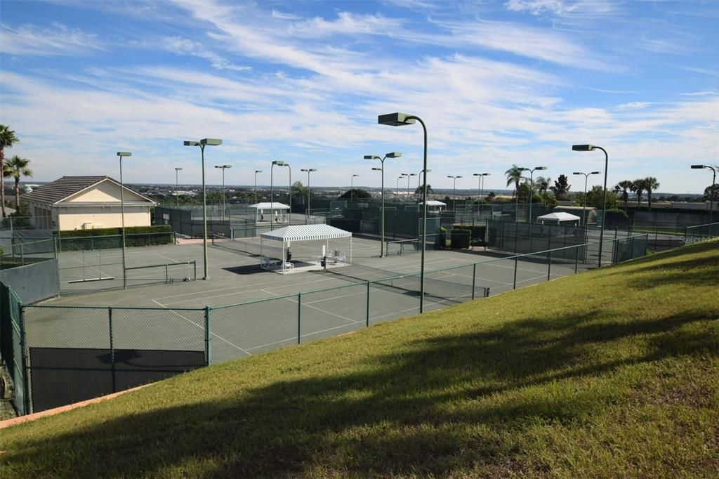 The coveted clay tennis courts of Summit Greens. Image 1 of 2