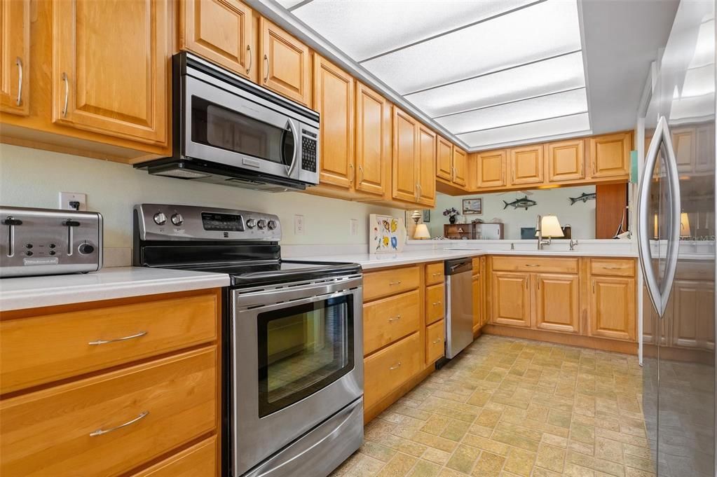 Kitchen with wood cabinets