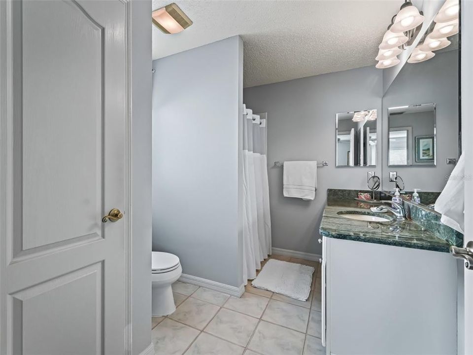 Master bath with walk-in shower, granite and spacious vanity. Large linen closet.