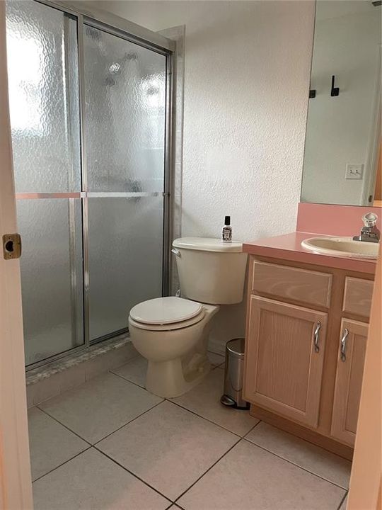 New floor in shower, new shower head and new toilet