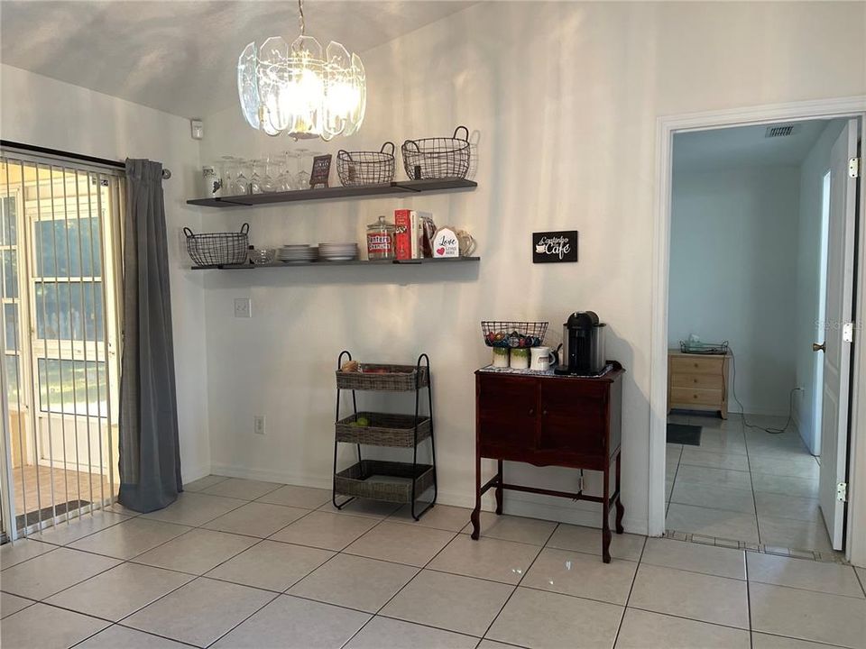 kitchen has wall shelves