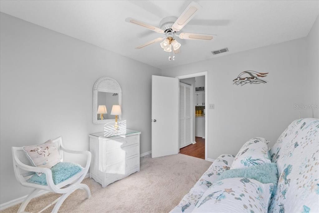 second bedroom and a peek at the large hall closet