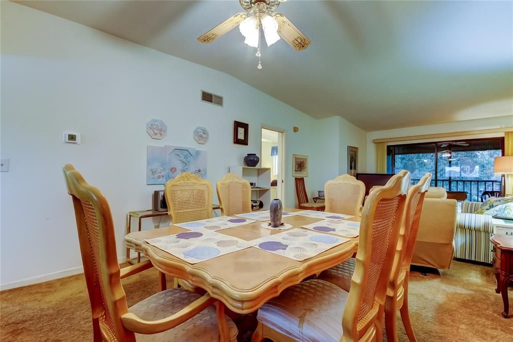 27. Dining Area (9' x 12') Opens to Living Area (12.10' x 16')...