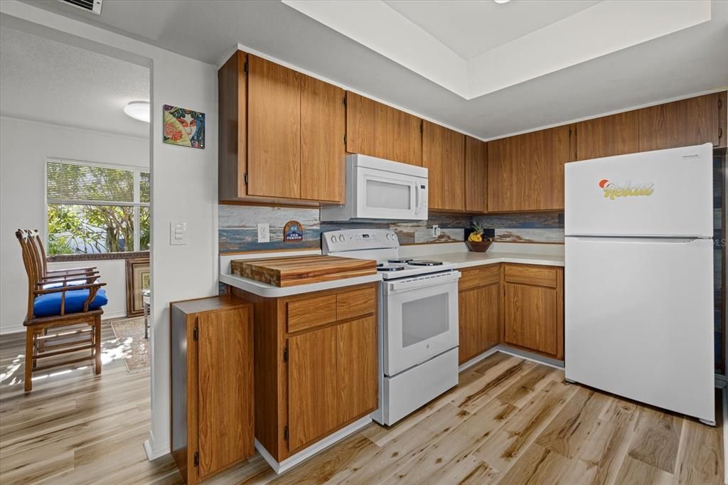 Kitchen with a view into Living Room