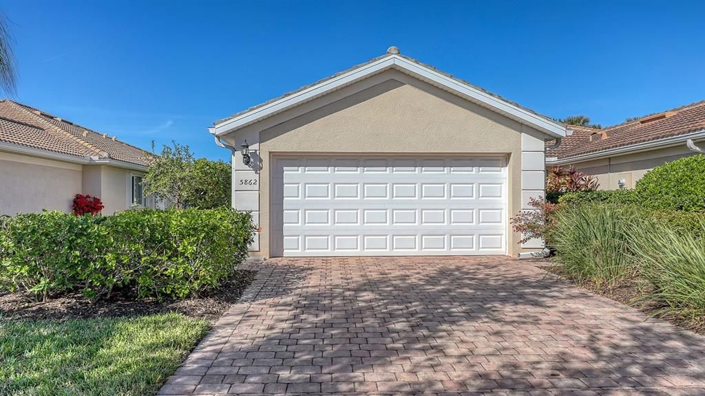 Paved Driveway & Spacious 2 Car Garage