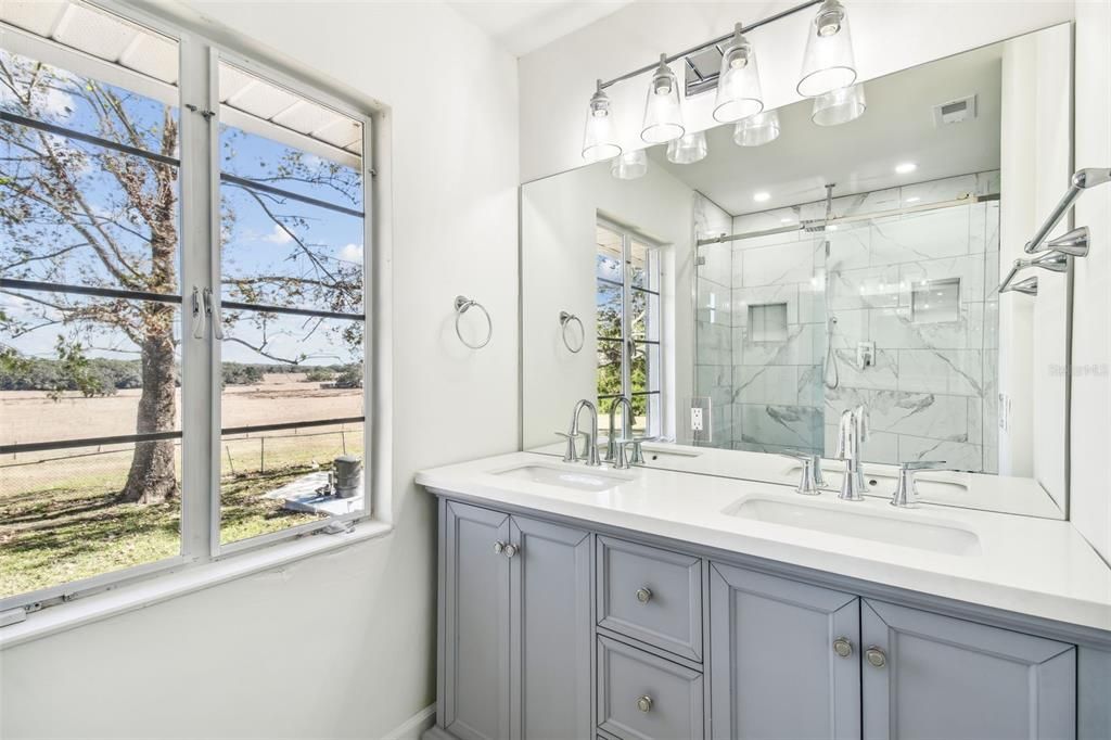 Walk-in shower + Rain Shower head.