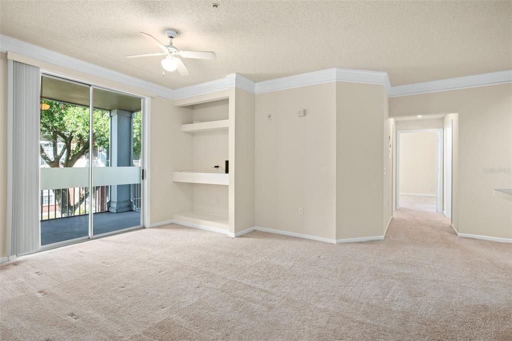 Family room with built in Shelving