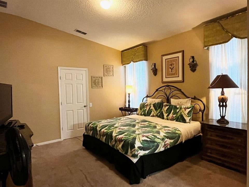 Spacious master bedroom with walk-in closet and owner's storge inside