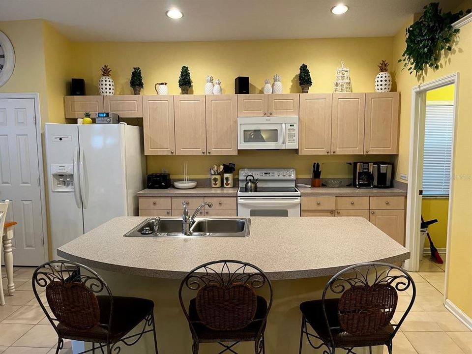 Kitchen with island and breakfast bar