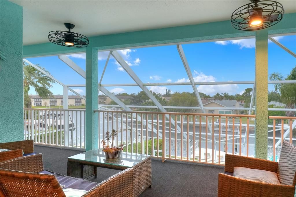 Balcony overlooking pool and canal