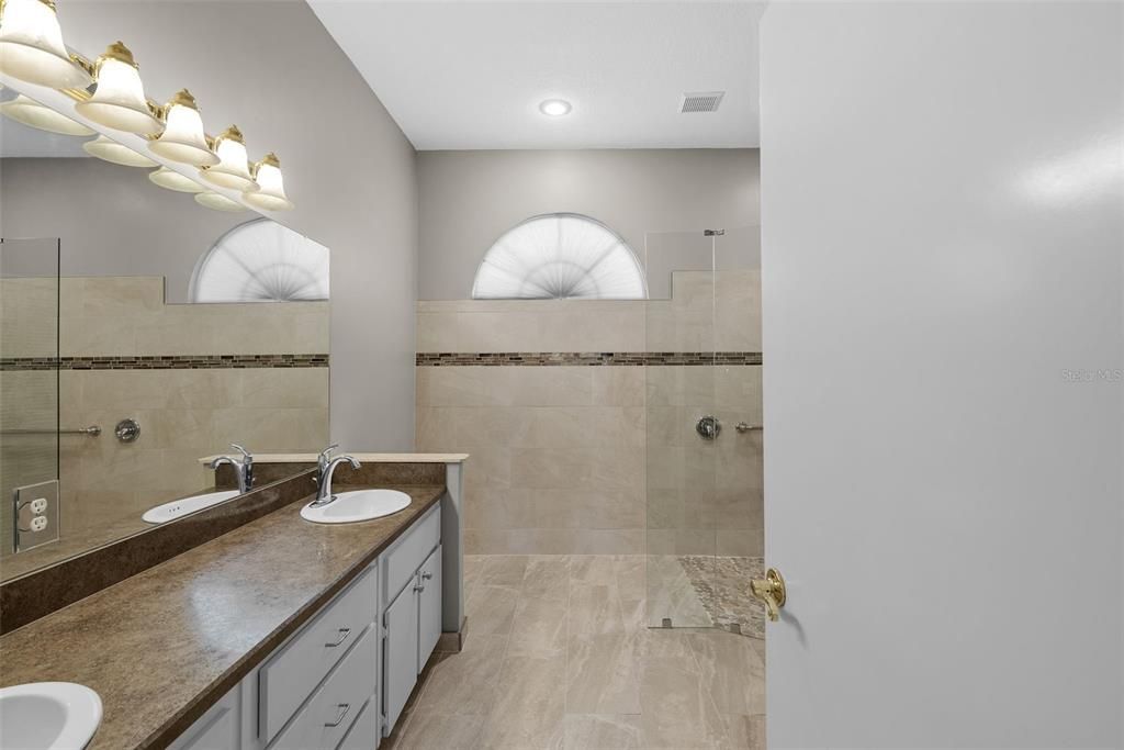 Master bathroom with dual sinks