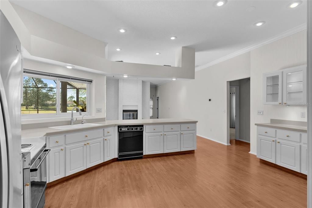 Kitchen with view of pool and golf course