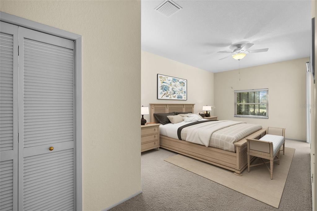 Master bedroom with vaulted ceilings and large walk-in closet