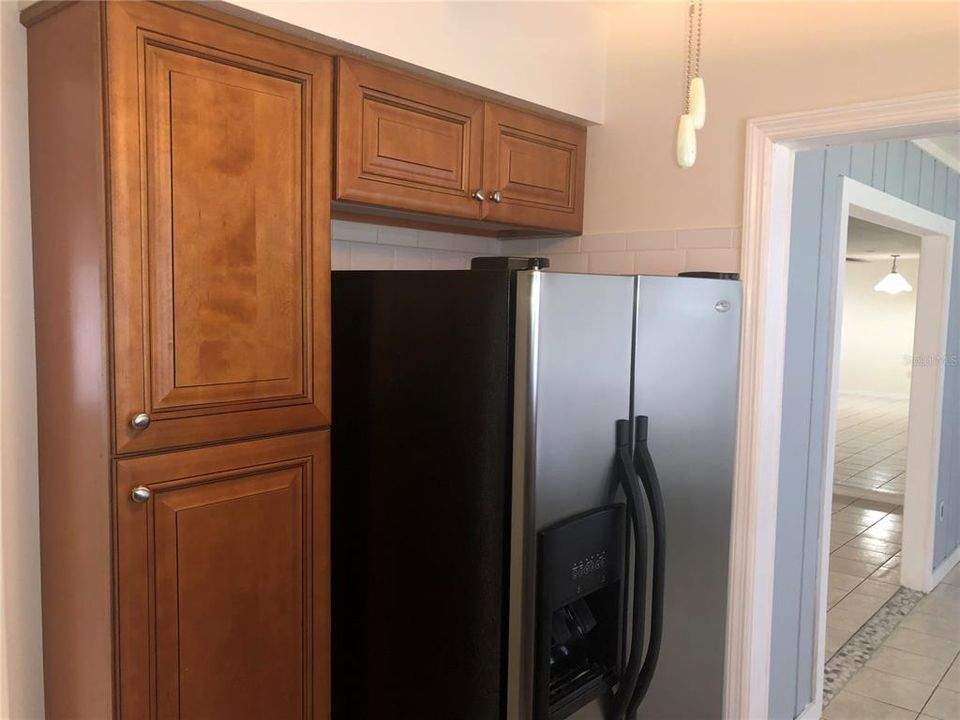 Stunning Wood Pantry and Overhead cabinets