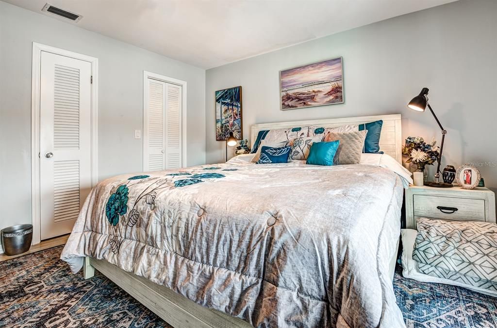 The primary bedroom features a walk-in closet and a separate linen closet.