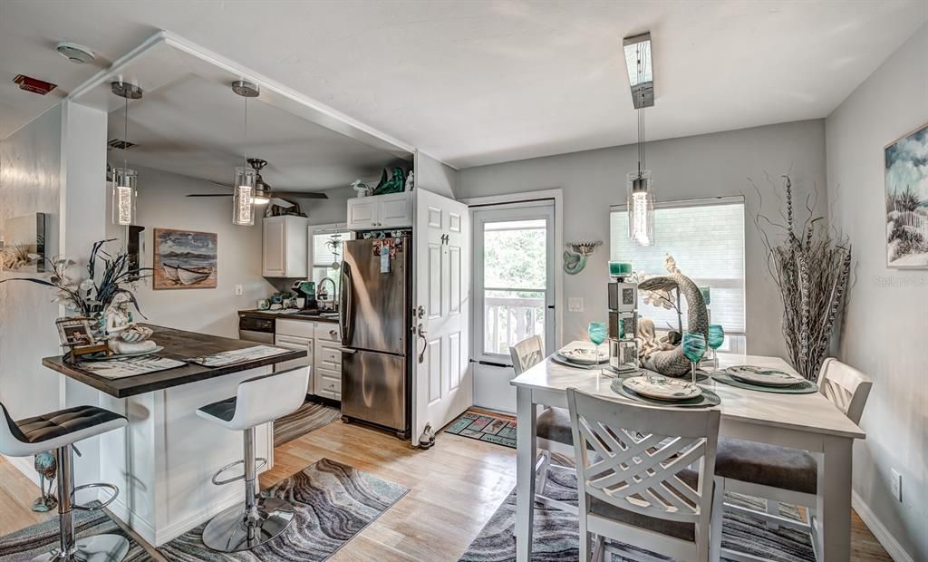 The dining room is open to the kitchen and great room making this home live much larger than its size.