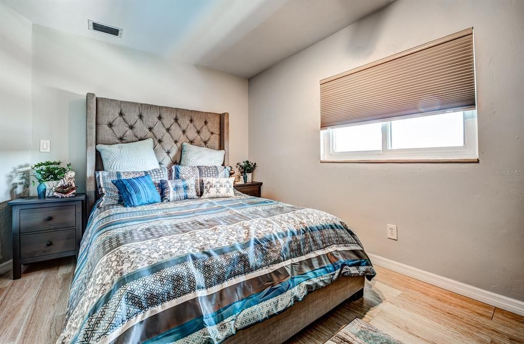 Bedroom 2 overlooks the pool and measures a spacious 13x9. You'll love the large walk-in closet which is connected to an additional walk-in storage closet, no lack of space in this unit.