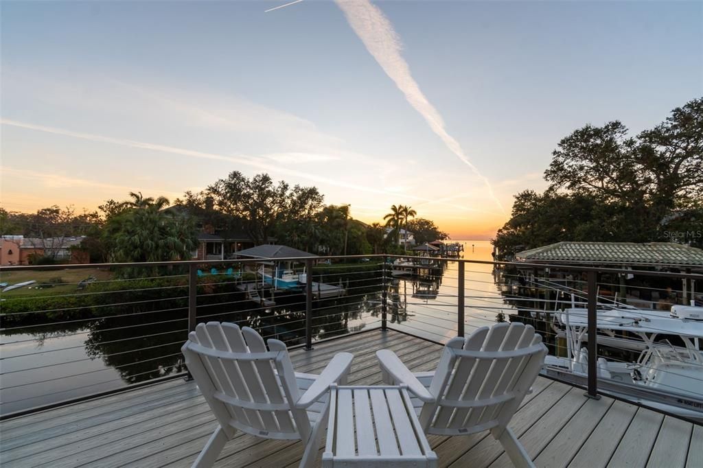 Enjoy evenings from the second-story dock looking down the canal at the sunset over Tampa Bay with a warm breeze washing over you.