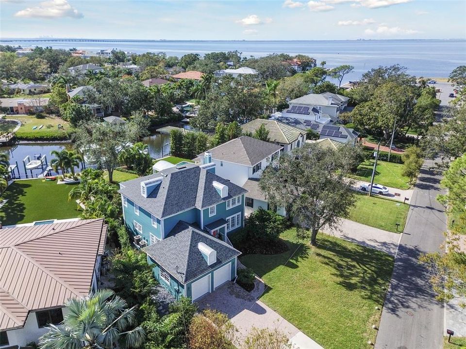 Welcome home to your coastal oasis on a wide, deepwater canal in South Tampa’s premier Sunset Park, just a short boat ride from open bay waters.