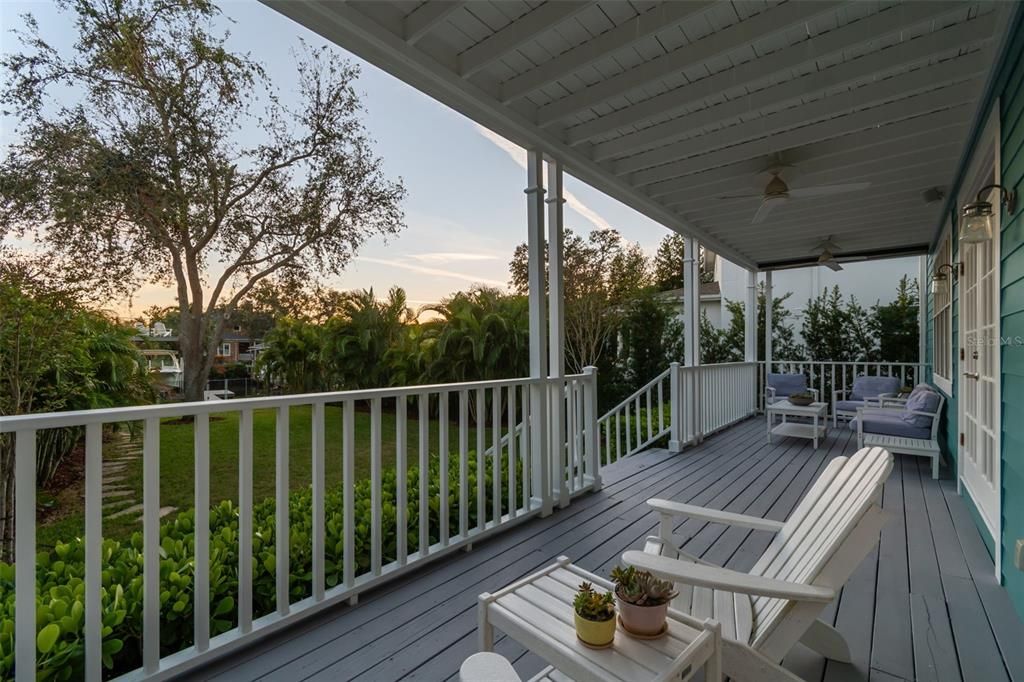 Rear porch provides canal and sunset views