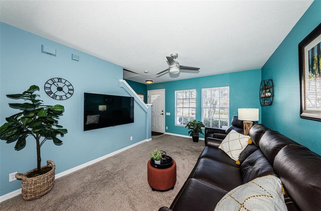 Living area with mounted flat screen TV