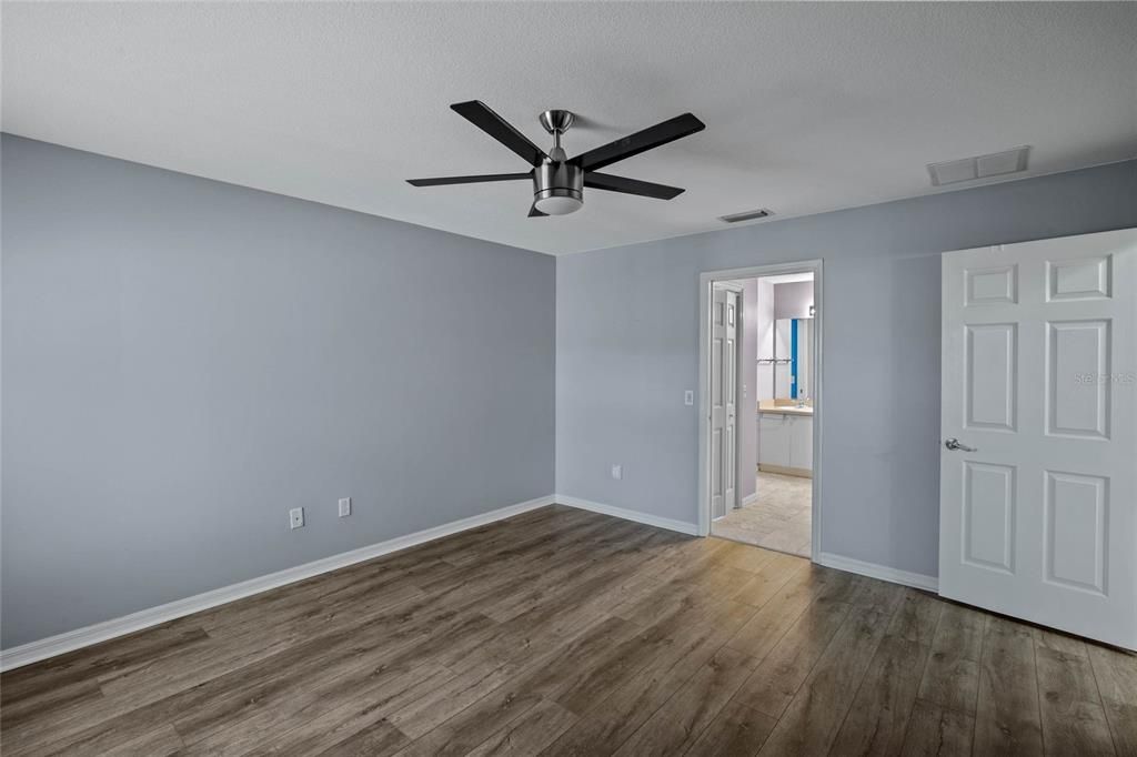 Master bedroom with two walk in closets