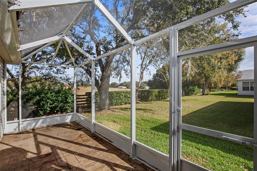 Side rear screened patio.