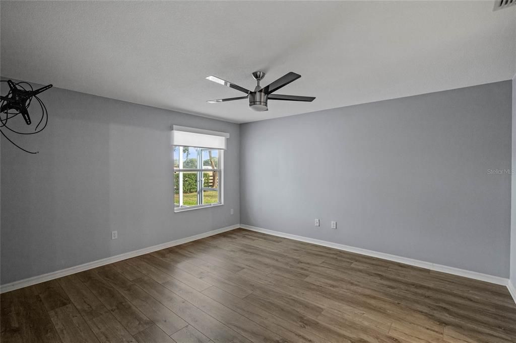 Master Bedroom with tv mount and electric blinds