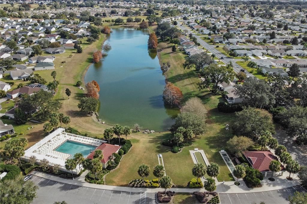 Aerial view of The Village of Summerhill amenities with lake behind.